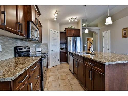 332 Stonecrest Place West, Lethbridge, AB - Indoor Photo Showing Kitchen With Double Sink With Upgraded Kitchen