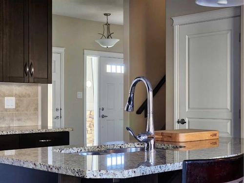 709 Twinriver Loop West, Lethbridge, AB - Indoor Photo Showing Kitchen With Double Sink