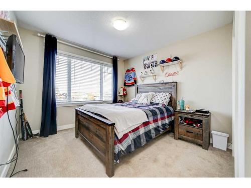 99 Mt Sundial Court West, Lethbridge, AB - Indoor Photo Showing Bedroom