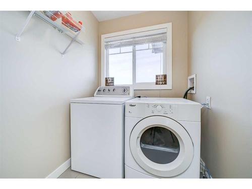 99 Mt Sundial Court West, Lethbridge, AB - Indoor Photo Showing Laundry Room