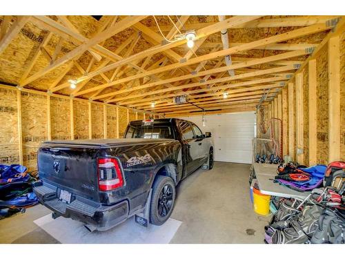 99 Mt Sundial Court West, Lethbridge, AB - Indoor Photo Showing Garage