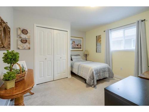 108 Mt Sundance Crescent West, Lethbridge, AB - Indoor Photo Showing Bedroom