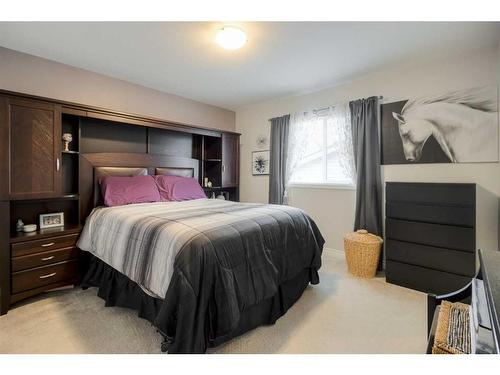 108 Mt Sundance Crescent West, Lethbridge, AB - Indoor Photo Showing Bedroom