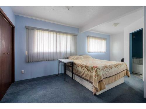 2219 20 Avenue, Coaldale, AB - Indoor Photo Showing Bedroom