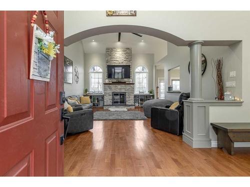 4918 40 Street, Taber, AB - Indoor Photo Showing Living Room With Fireplace