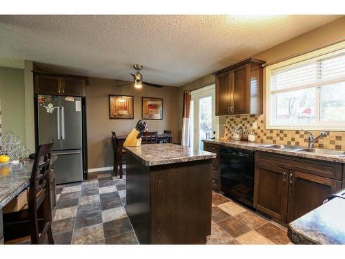 2022 23Rd Avenue North, Lethbridge, AB - Indoor Photo Showing Kitchen With Double Sink