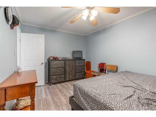 4816 51 Avenue, Taber, AB - Indoor Photo Showing Bedroom