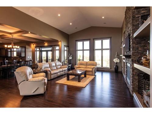 14 Countrylane Blvd, Rural Taber, M.D. Of, AB - Indoor Photo Showing Living Room With Fireplace