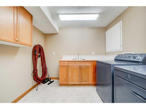 110 Cougar Crescent North, Lethbridge, AB - Indoor Photo Showing Laundry Room