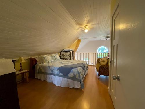 202 5 Street, Cowley, AB - Indoor Photo Showing Bedroom