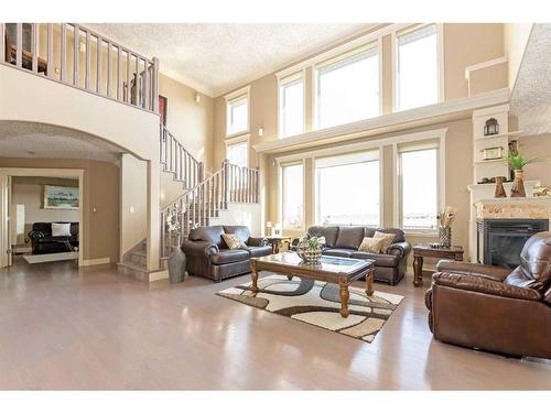 135 Stonecrest Point West, Lethbridge, AB - Indoor Photo Showing Living Room With Fireplace