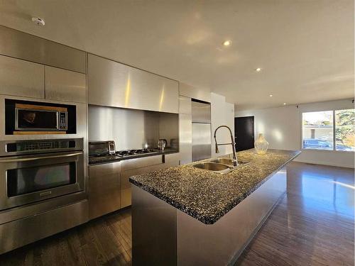 1138 Great Lakes Road South, Lethbridge, AB - Indoor Photo Showing Kitchen With Double Sink With Upgraded Kitchen