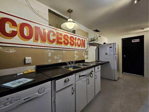 1138 Great Lakes Road South, Lethbridge, AB - Indoor Photo Showing Kitchen With Double Sink