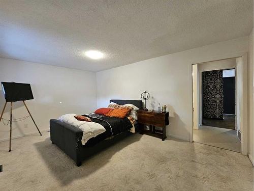 1138 Great Lakes Road South, Lethbridge, AB - Indoor Photo Showing Bedroom