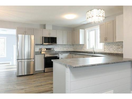 137 3Rd Street South, Picture Butte, AB - Indoor Photo Showing Kitchen With Double Sink