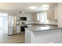 137 3Rd Street South, Picture Butte, AB  - Indoor Photo Showing Kitchen With Double Sink 