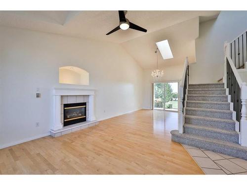 84 Canyon Boulevard West, Lethbridge, AB - Indoor Photo Showing Living Room With Fireplace