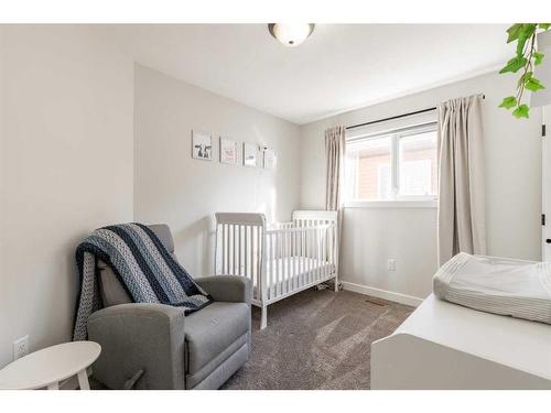 402 10A Street, Nobleford, AB - Indoor Photo Showing Bedroom