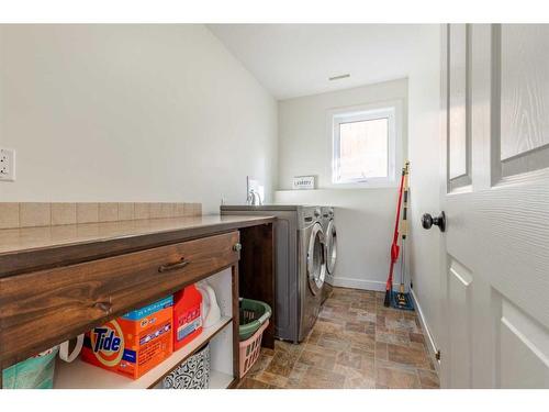 402 10A Street, Nobleford, AB - Indoor Photo Showing Laundry Room