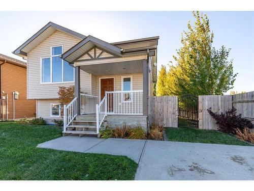 402 10A Street, Nobleford, AB - Outdoor With Deck Patio Veranda With Facade