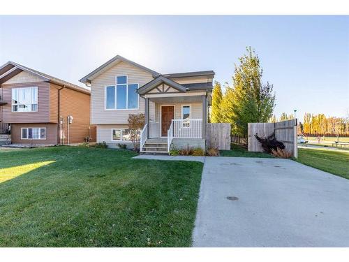 402 10A Street, Nobleford, AB - Outdoor With Deck Patio Veranda With Facade