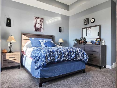 37 Quarry Bank Road, Raymond, AB - Indoor Photo Showing Bedroom