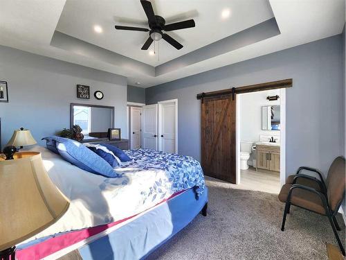 37 Quarry Bank Road, Raymond, AB - Indoor Photo Showing Bedroom