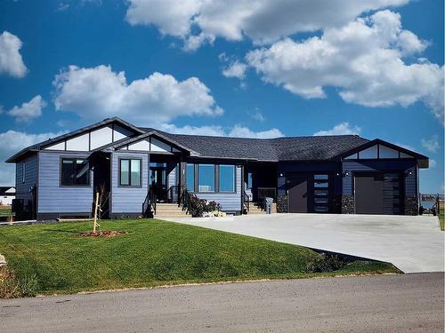 37 Quarry Bank Road, Raymond, AB - Outdoor With Facade