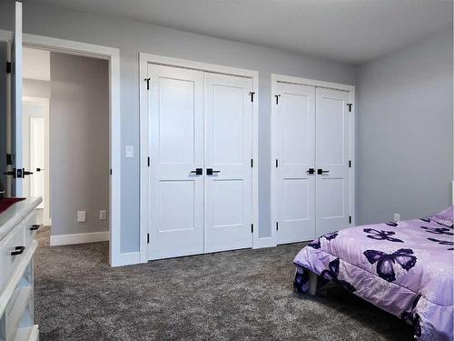 37 Quarry Bank Road, Raymond, AB - Indoor Photo Showing Bedroom