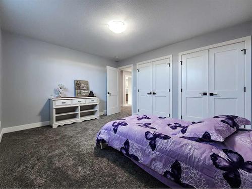 37 Quarry Bank Road, Raymond, AB - Indoor Photo Showing Bedroom