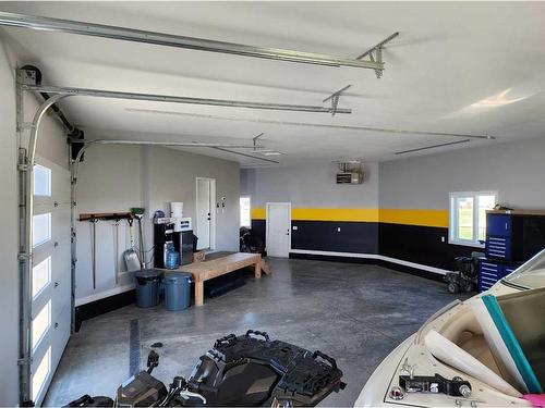 37 Quarry Bank Road, Raymond, AB - Indoor Photo Showing Garage