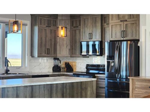 37 Quarry Bank Road, Raymond, AB - Indoor Photo Showing Kitchen