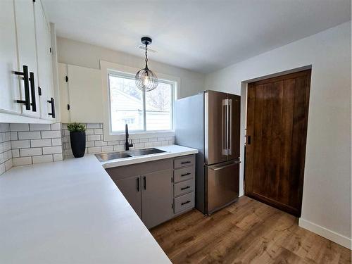 215 Dufferin Street, Granum, AB - Indoor Photo Showing Kitchen With Double Sink