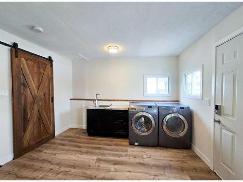 215 Dufferin Street, Granum, AB - Indoor Photo Showing Laundry Room