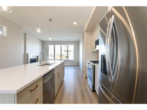 1153 Abitibi Road West, Lethbridge, AB - Indoor Photo Showing Kitchen With Stainless Steel Kitchen With Double Sink With Upgraded Kitchen