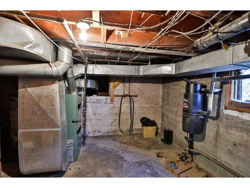 44 E 100 S, Raymond, AB - Indoor Photo Showing Basement