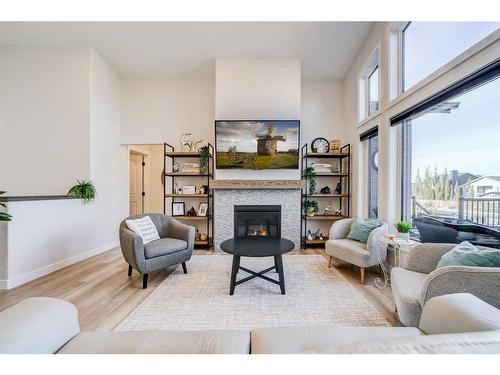 2018 30A Avenue, Coaldale, AB - Indoor Photo Showing Living Room With Fireplace