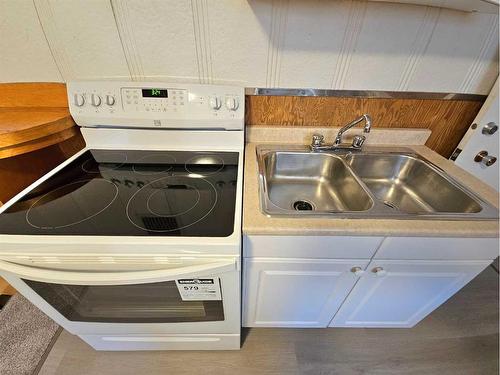 611 17 Street South, Lethbridge, AB - Indoor Photo Showing Kitchen With Double Sink