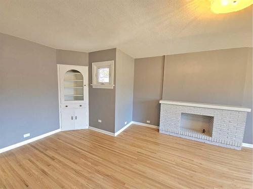 611 17 Street South, Lethbridge, AB - Indoor With Fireplace