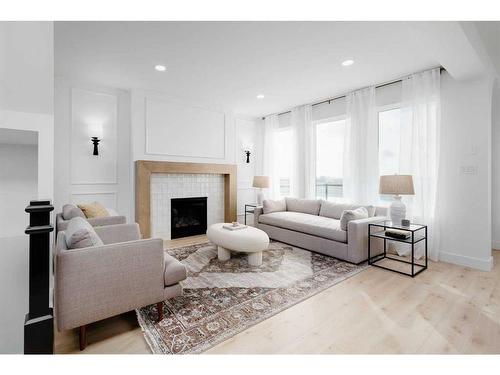 4618 31 Avenue South, Lethbridge, AB - Indoor Photo Showing Living Room With Fireplace