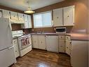 1406 85 Street, Coleman, AB  - Indoor Photo Showing Kitchen With Double Sink 