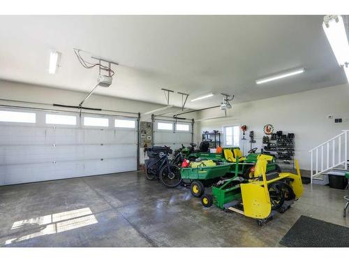 29 Pebble Creek Cove, Raymond, AB - Indoor Photo Showing Garage