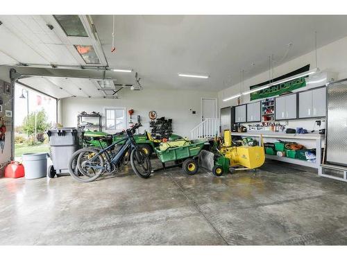 29 Pebble Creek Cove, Raymond, AB - Indoor Photo Showing Garage