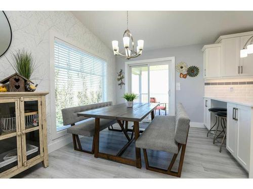 29 Pebble Creek Cove, Raymond, AB - Indoor Photo Showing Dining Room