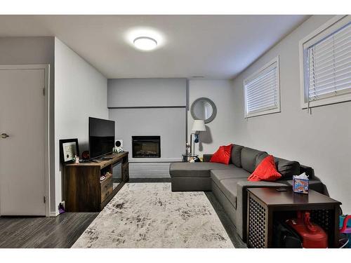 1193 Scenic Drive South, Lethbridge, AB - Indoor Photo Showing Living Room With Fireplace