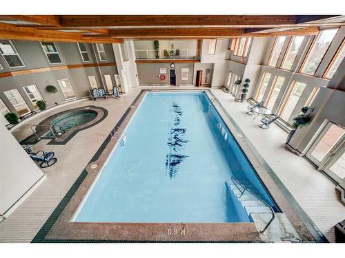 323-100 2 Avenue South, Lethbridge, AB - Indoor Photo Showing Other Room With In Ground Pool