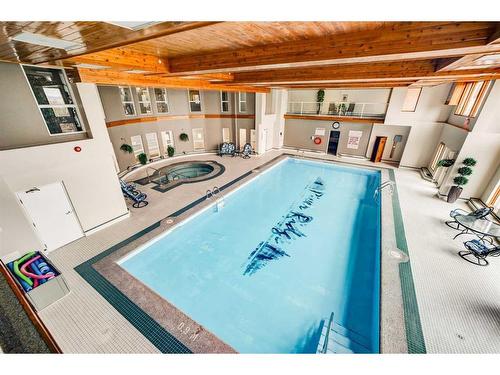 323-100 2 Avenue South, Lethbridge, AB - Indoor Photo Showing Other Room With In Ground Pool