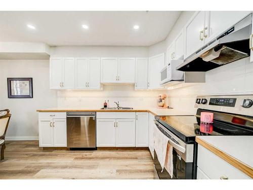 323-100 2 Avenue South, Lethbridge, AB - Indoor Photo Showing Kitchen With Double Sink