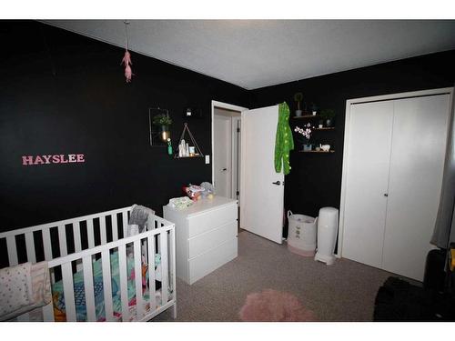 2107 10 Street, Coaldale, AB - Indoor Photo Showing Bedroom