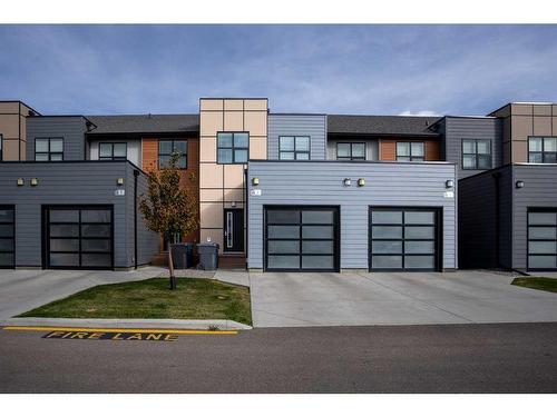 3-57 Aquitania Circle West, Lethbridge, AB - Outdoor With Facade